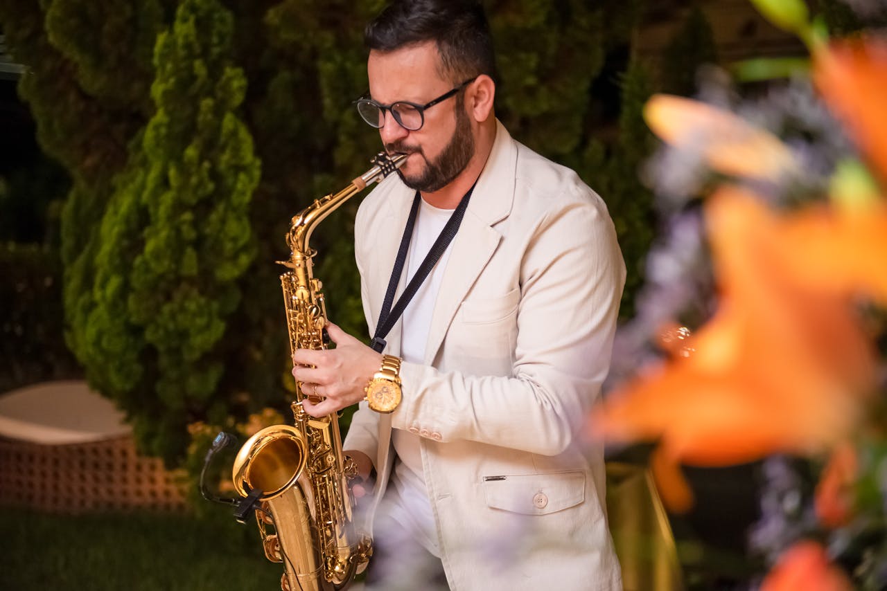 A saxophonist playing outdoors in Salvador, Brazil, creating a lively musical atmosphere.